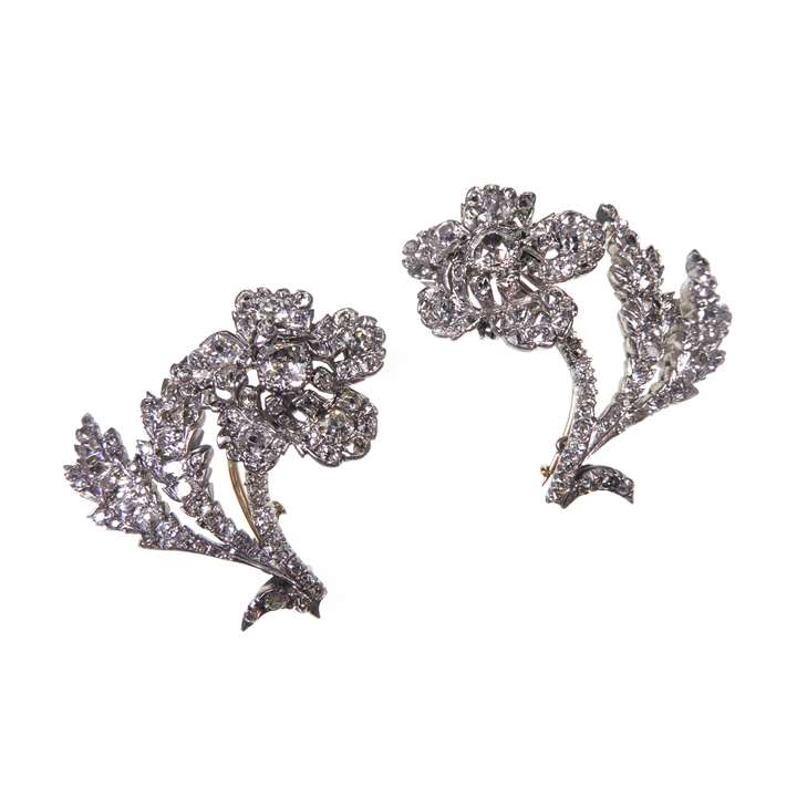 Pair of cushion cut diamond flowerhead brooches